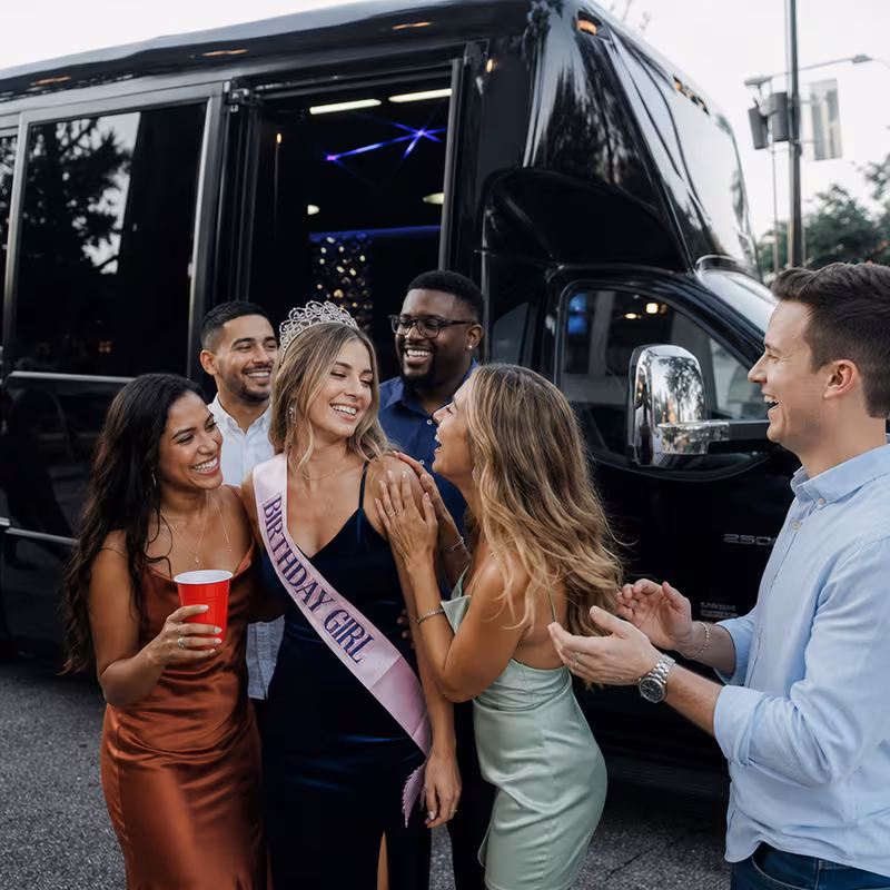 Party bus interior with wraparound leather seating and LED lighting in Charlotte