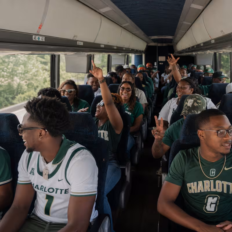 Black Mercedes Sprinter van staged for an Charlotte Sporting Event Transportation group